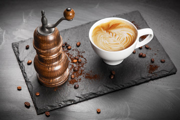 Cup of coffee on stone board