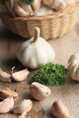 heap garlic on wood background