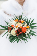 Bride holding a bouquet of flowers, wedding bouquet