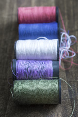 bobbins with thread on the table