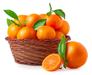 organic ripe mandarins in basket on white background