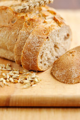 Close-up on traditional bread on wooden board