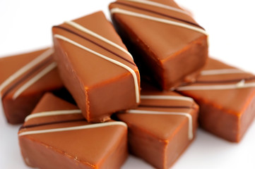 Chocolate praline on white background