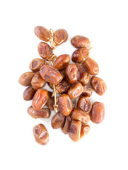 Dried dates palm fruit isolated on white background.