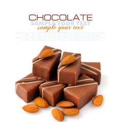 Chocolate praline with almonds on white background