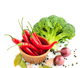 Vegetables and spices on a white background