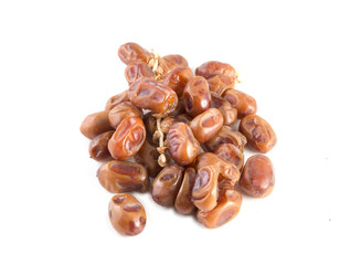 Dried dates palm fruit isolated on white background.