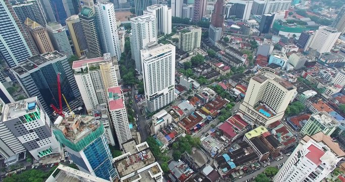 Aerial view of Kuala Lumpur city in Malaysia capital, tall buildings.