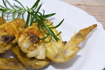 fried chicken wings on wood