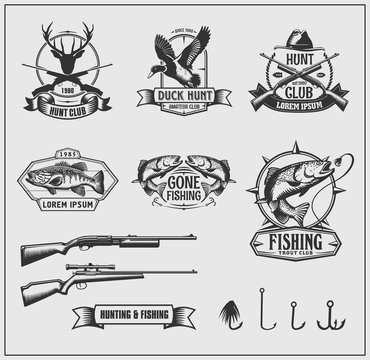 Set of hunting and fishing club badges, labels and design elements. Vector monochrome illustration.