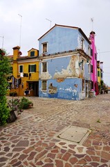 Colorful buildings in the village of Burano in the Venetian Laguna, Italy 

