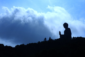 A silhouette sunset at Honking / Buddha on the mountain