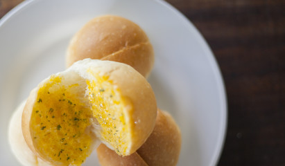 Sliced of round bread with butter