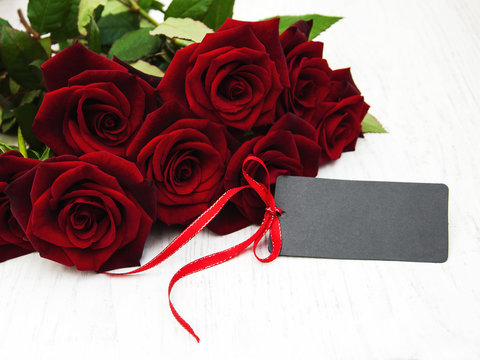 Red roses and greeting card