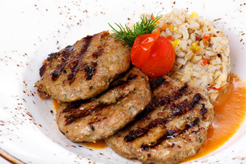 Kyufta cutlets with pilaf