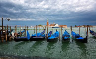 Fototapeta na wymiar Gondolas on the Grand Canal against the background of the church of San Giorgio Maggiore, Venice, Italy