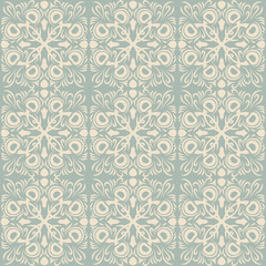Elegant antique background image of peacock feather kaleidoscope pattern.
