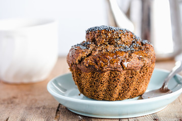 Chocolate  muffins with carob, honey, raisins and poppy seeds, d