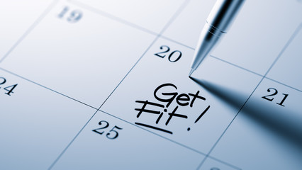 Closeup of a personal agenda setting an important date written w