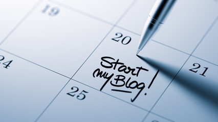 Closeup of a personal agenda setting an important date written w