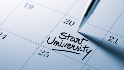 Closeup of a personal agenda setting an important date written w