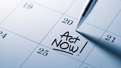 Closeup of a personal agenda setting an important date written w