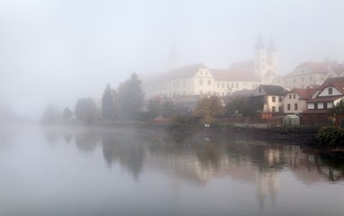 Morning view of Telc or Teltsch town mirroring in lake
