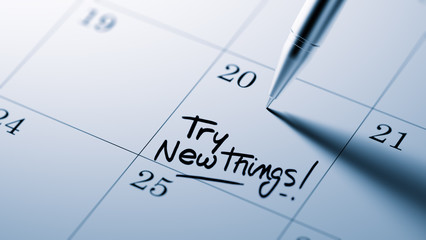 Closeup of a personal agenda setting an important date written w