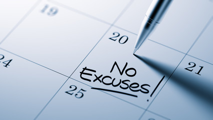 Closeup of a personal agenda setting an important date written w