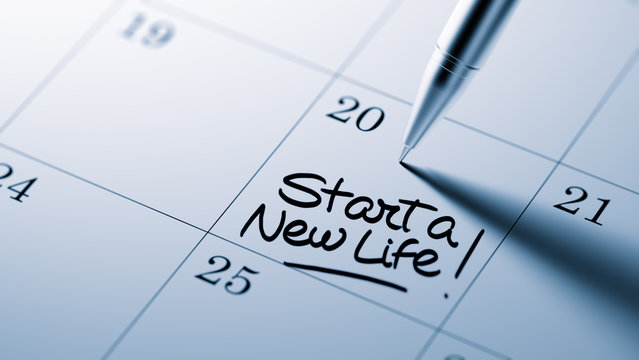 Closeup of a personal agenda setting an important date written w