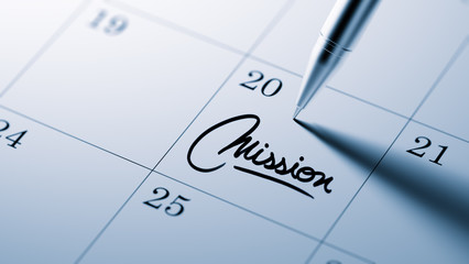 Closeup of a personal agenda setting an important date written w