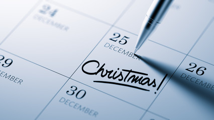 Closeup of a personal agenda setting an important date written w