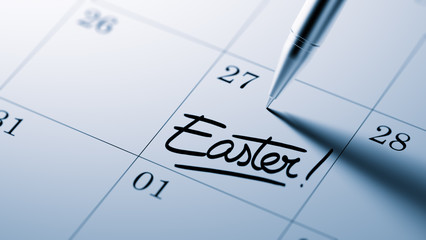 Closeup of a personal agenda setting an important date written w