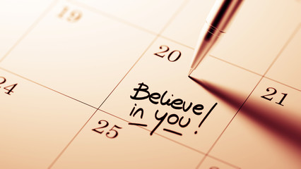 Closeup of a personal agenda setting an important date written w