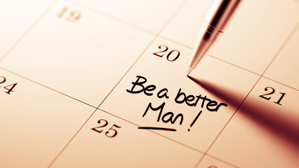 Closeup of a personal agenda setting an important date written w