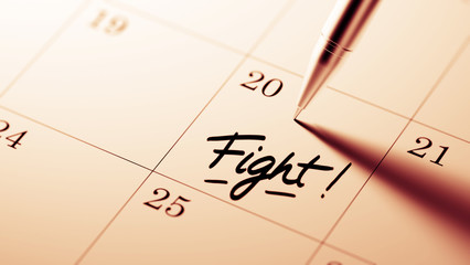 Closeup of a personal agenda setting an important date written w