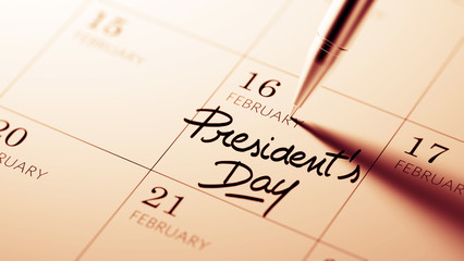 Closeup of a personal agenda setting an important date written w