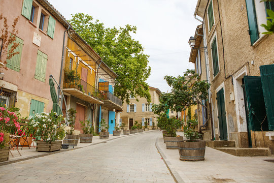 Fototapeta Provencal street with typical houses in southern France, Provenc