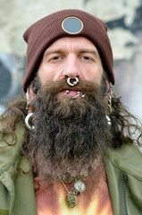 Portrait of an pierced and bearded Men