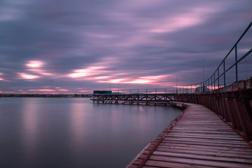 Fototapeta na wymiar Sunset over the fishing pier of bulgarian black sea coast