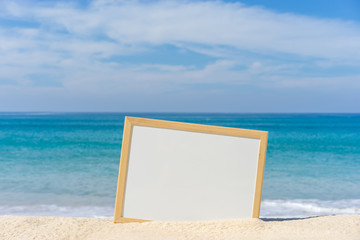 White board on the beach for your text.
