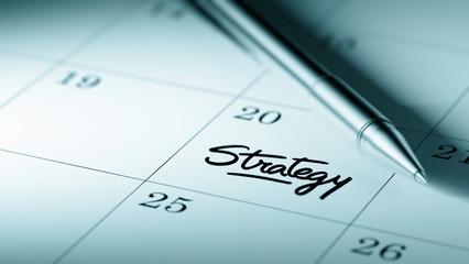 Closeup of a personal agenda setting an important date written w