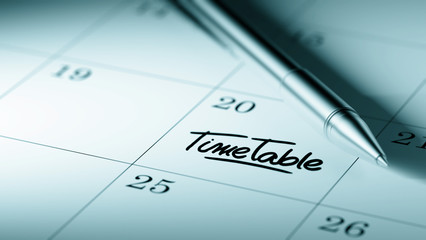 Closeup of a personal agenda setting an important date written w