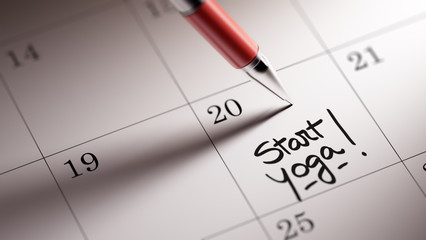 Closeup of a personal agenda setting an important date written w