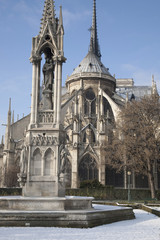Notre Dame Cathedral Church in the Snow in Winter in Paris, France
