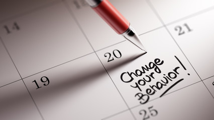 Closeup of a personal agenda setting an important date written w