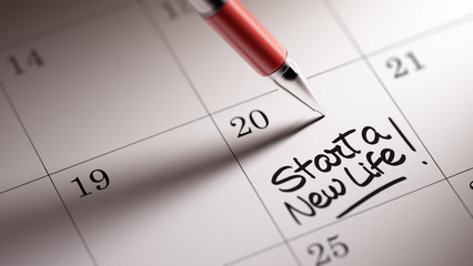 Closeup of a personal agenda setting an important date written w