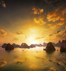 Sunset over the islands of Halong Bay in northern Vietnam. Amazing landscape background