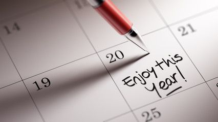 Closeup of a personal agenda setting an important date written w