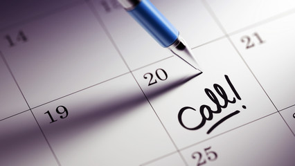 Closeup of a personal agenda setting an important date written w